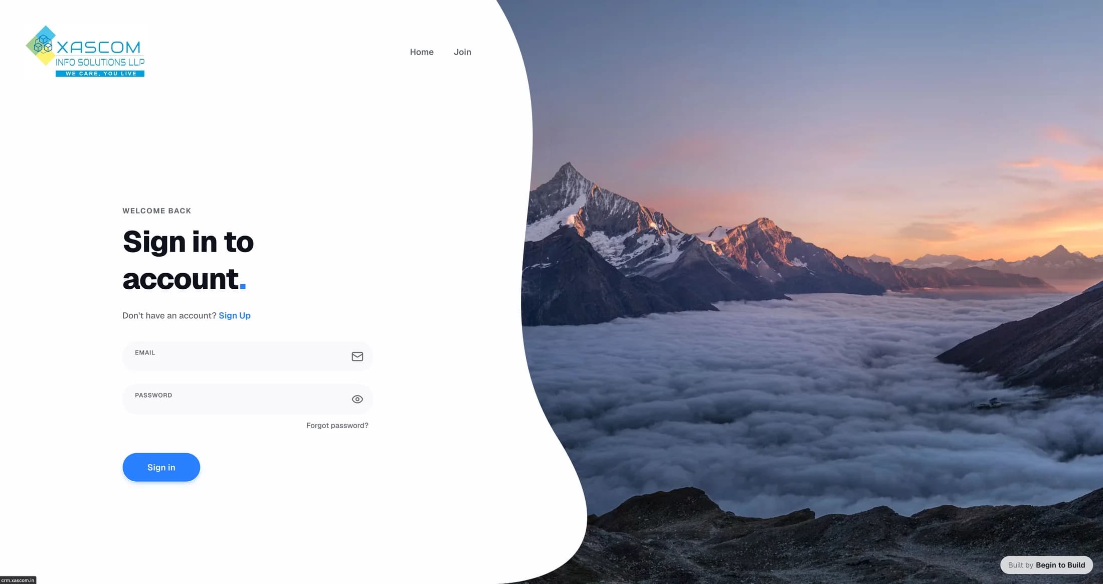 Xascom CRM sign-in screen with email and password fields beside a mountain landscape